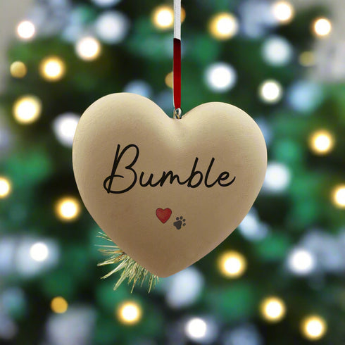 A Personalised Paw Print & Heart Ceramic Heart Bauble